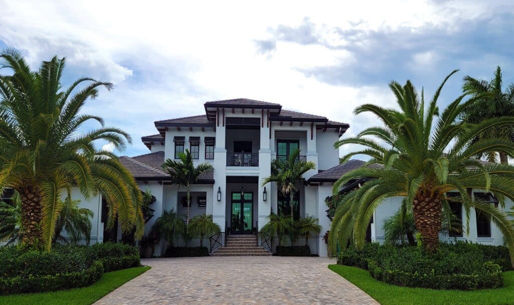 Luxury house cleaning Naples FL - elegant waterfront home exterior